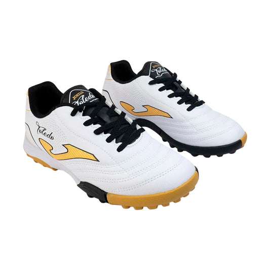 TENIS JOMA TOLEDO JR TF JUVENIL COLOR BLANCO NEGRO ORO